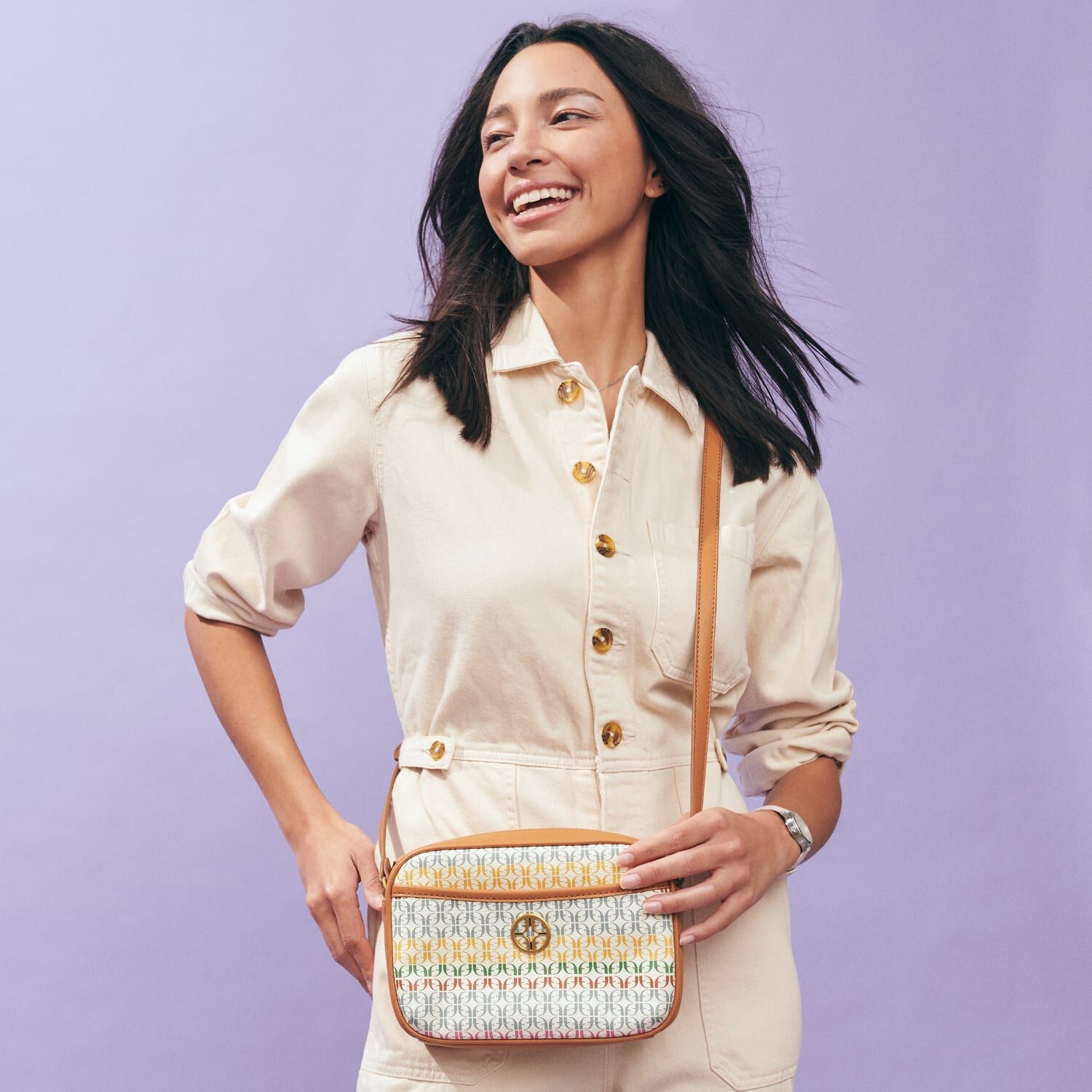 Woman wearing bag.