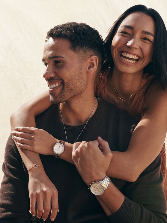 Man and woman wearing watches.