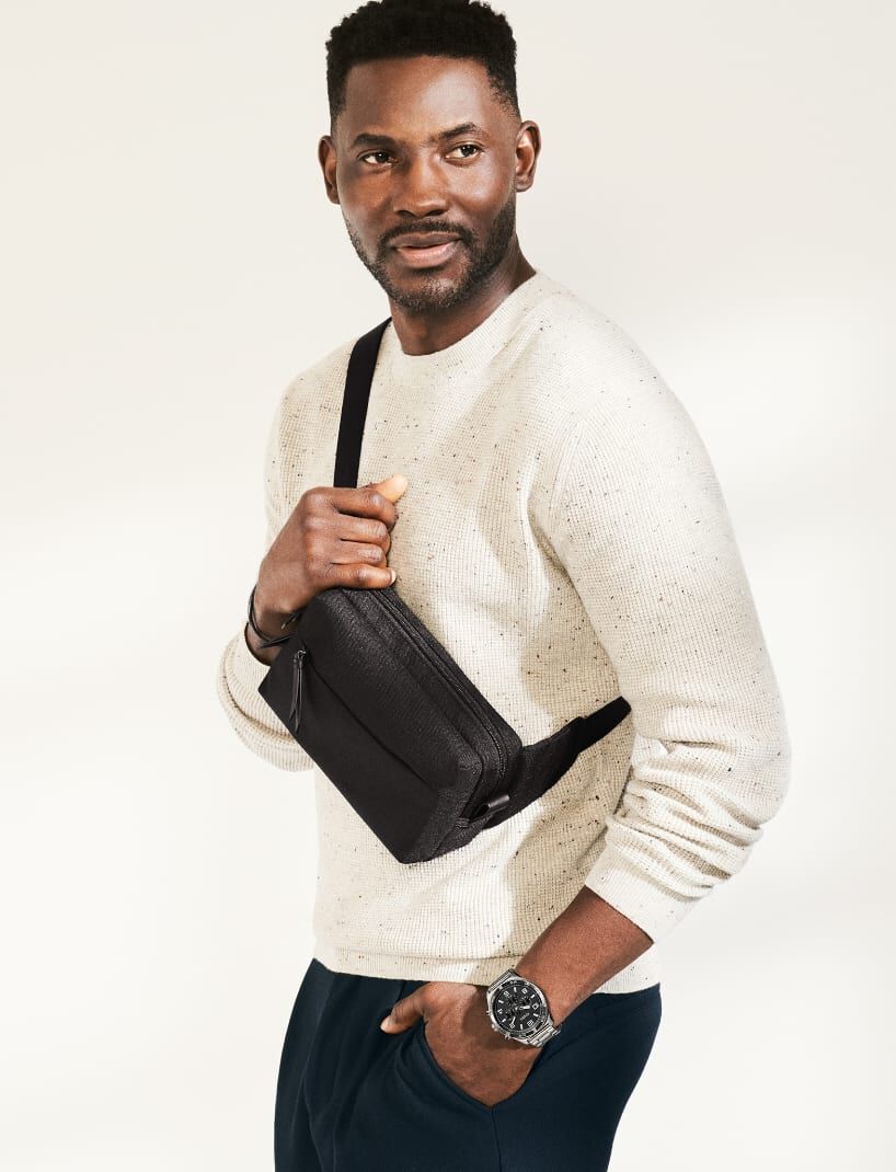 Man wearing bag.