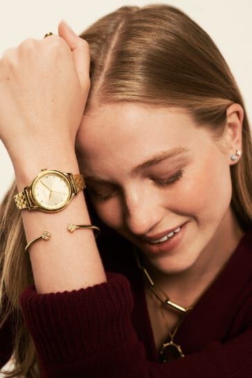 Woman wearing watch.