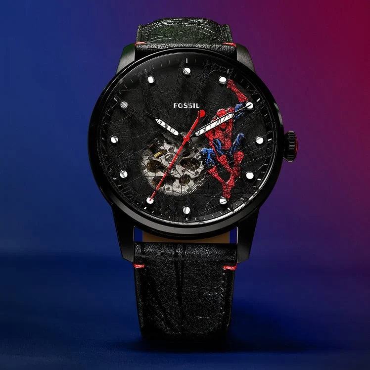 A full view of the black and red Fossil Spider-Man watch that shows the graphic comic-style dial and black leather strap with webbed detail.