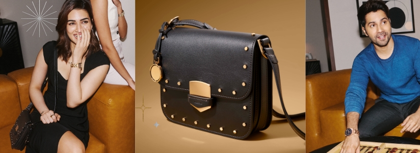 A woman smiling and carrying a stack of gifts in a red bow. The black leather Lennox handbag with stud accents. A man playing dominoes and wearing a Fossil Blue GMT watch.