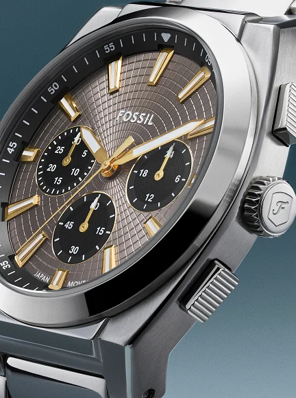 A detailed photo of the Everett watch reveals the textured dial and gunmetal finish.