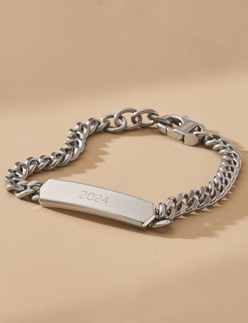 A chain ID bracelet engraved with the year 2024.