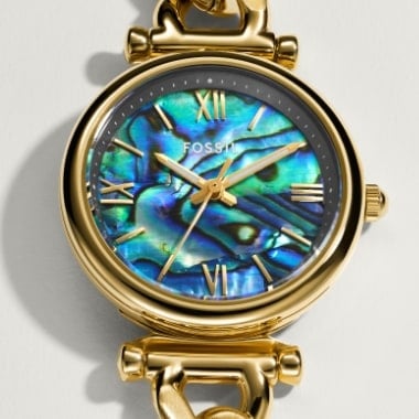 The gold-tone Day-to-Night Raquel watch with a mother-of-pearl dial.