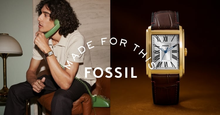 Made For This Fossil. A man on a telephone wearing the Fossil Carraway watch.