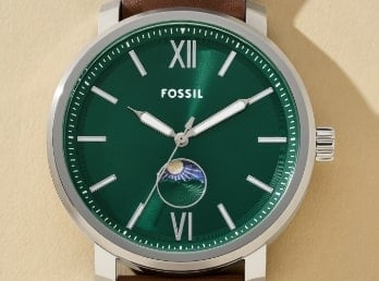 A men's watch featuring a green dial and celestial tracking.