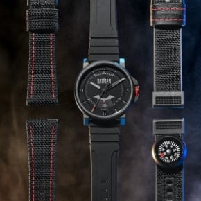 Red bat graphics and the black Batman x Fossil watch with two extra black straps.