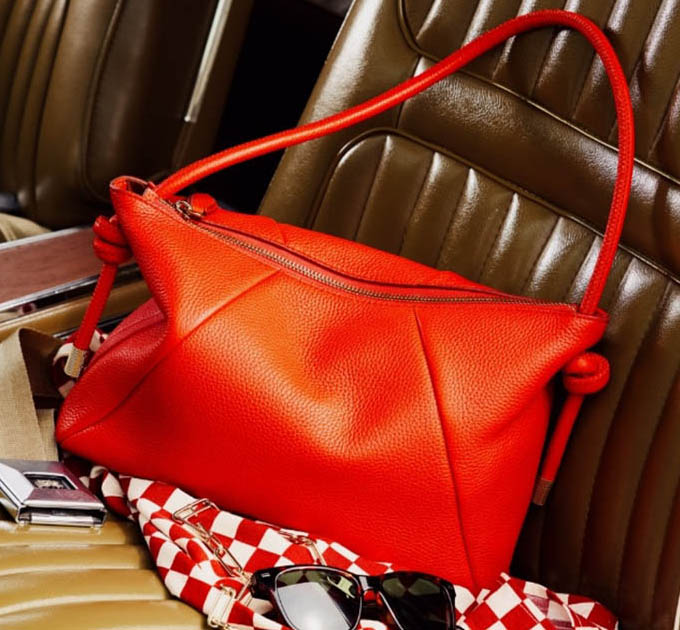 A women's shoulder bag in bright red leather.
