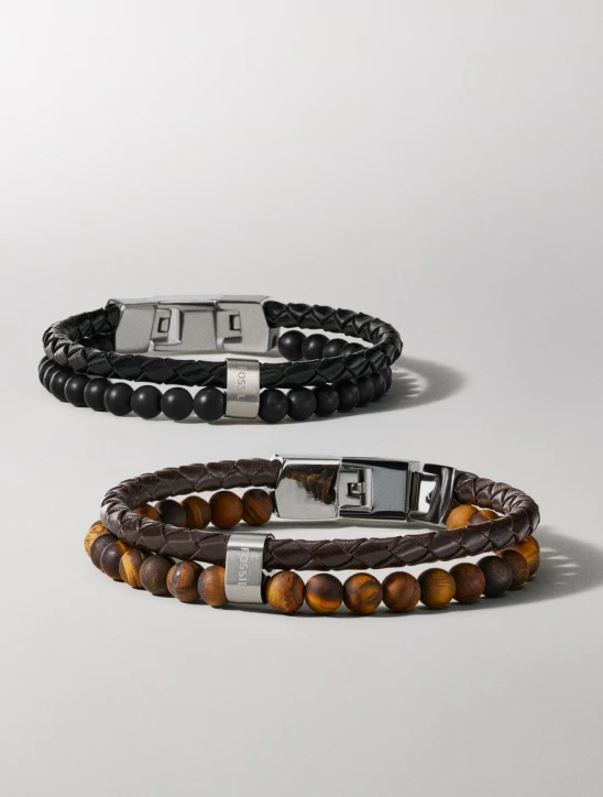 A Fossil stainless steel curb chain bracelet with an engravable ID plate.