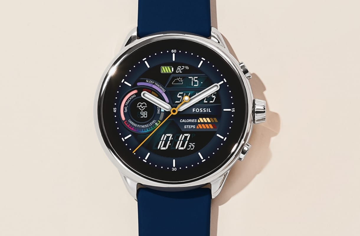 A stainless steel smartwatch with navy strap and dial showcasing the date and a heart rate and step tracker.