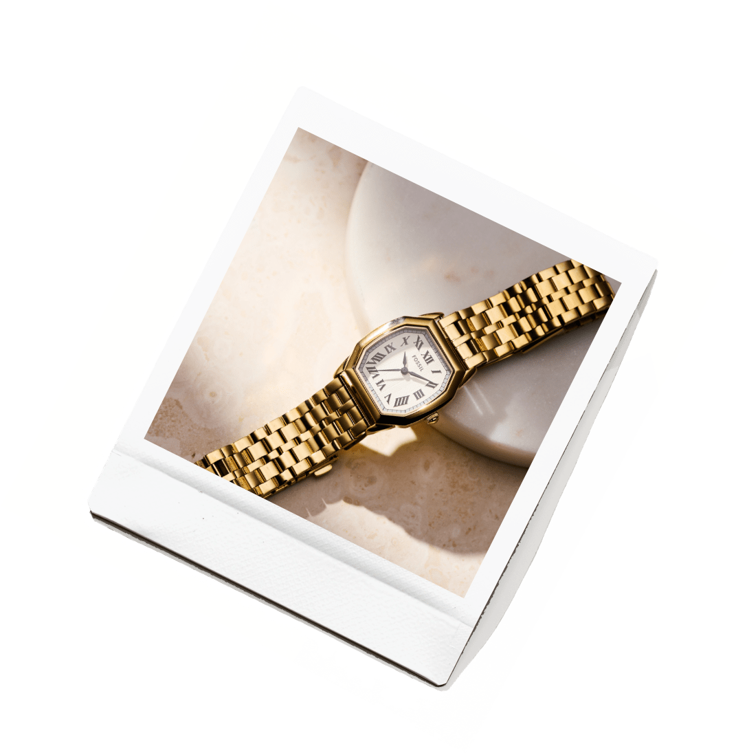 Polaroid photo of watch.