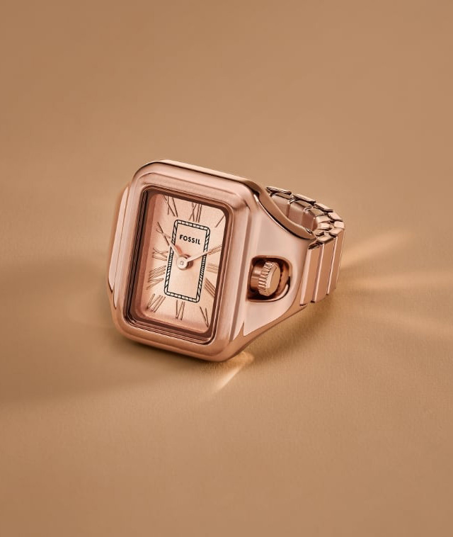 Une bague-montre Raquel ton or rose.