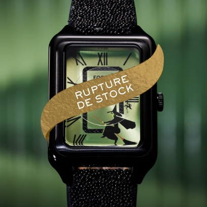 Une montre noire et verte avec un boîtier rectangulaire et des motifs inspirés de La Méchante Sorcière.