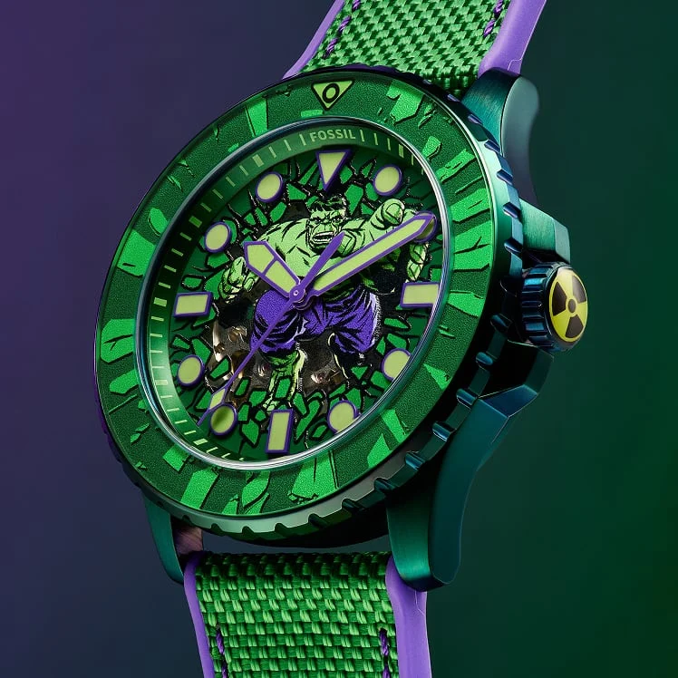 A detailed view of the green and purple Fossil Hulk watch dial, featuring archival Marvel comic art.