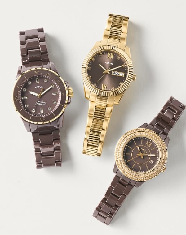 Three brown-hued watches.