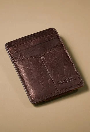 A brown leather card case featuring a custom embossing.