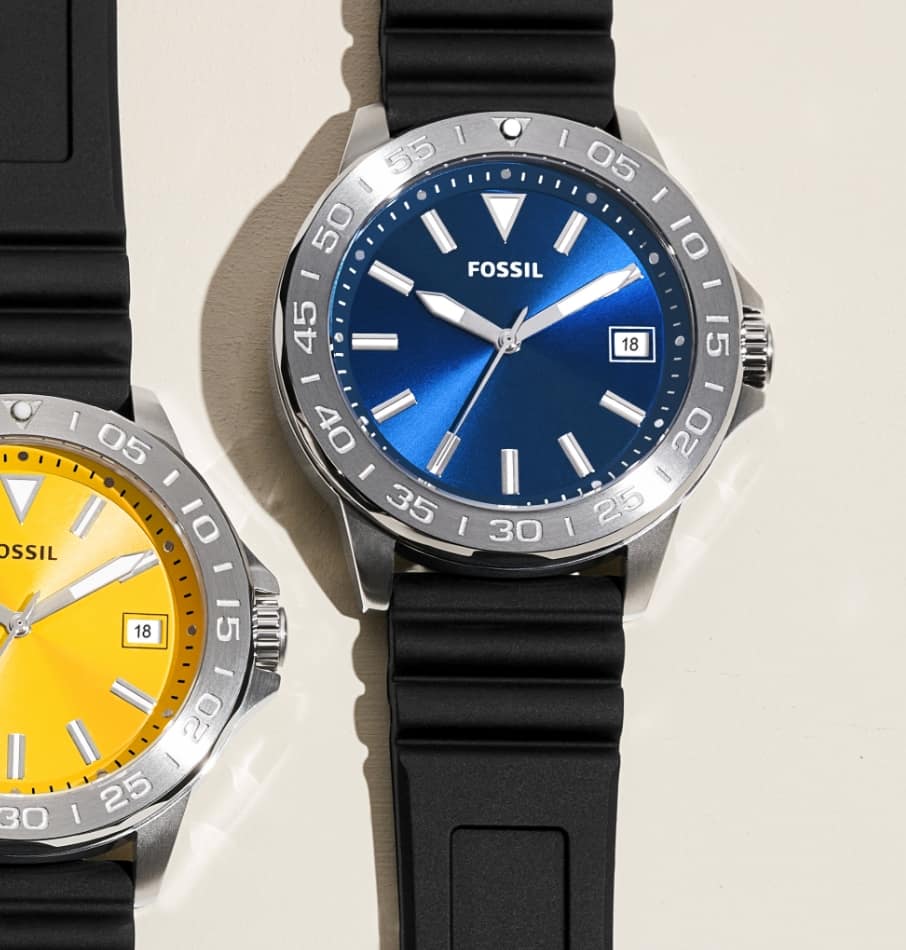 Men’s sporty watches with a black strap and colourful dials in orange, green, red, yellow and blue.