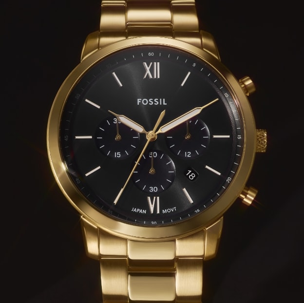 Gold-tone Neutra watch.