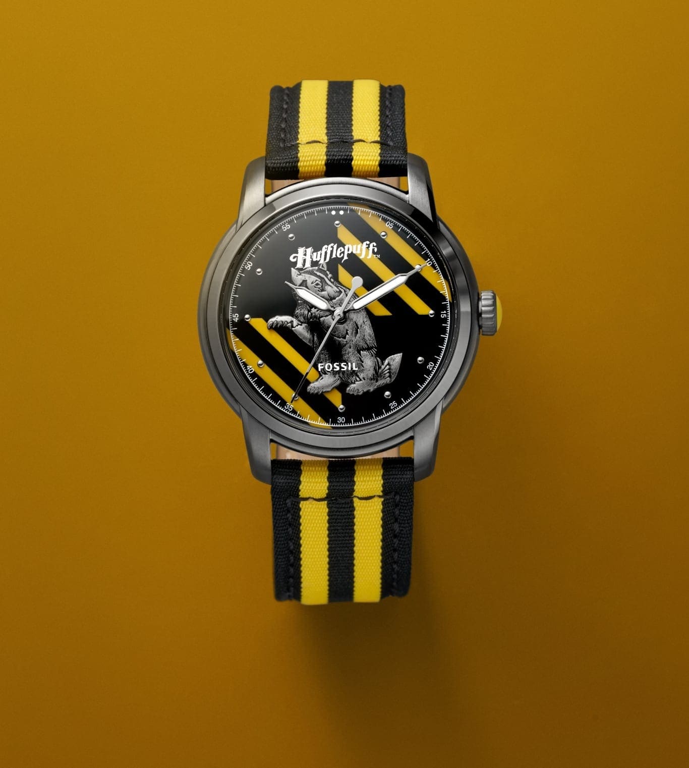 Silver-tone Hufflepuff house watch with a black and yellow strap.