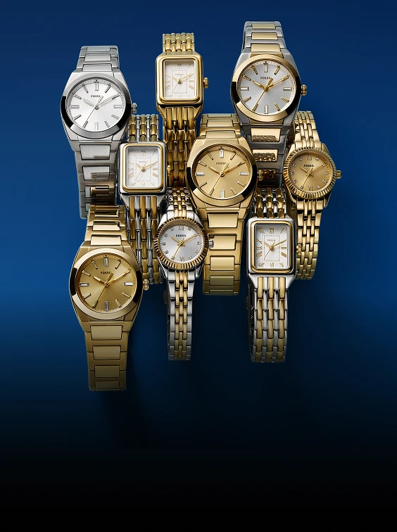 Woman showing off multiple Fossil minis.