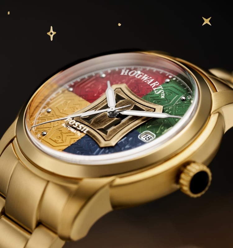 Gold-tone Harry Potter™ Automatic Watch featuring Hogwarts™ house colours on the dial.