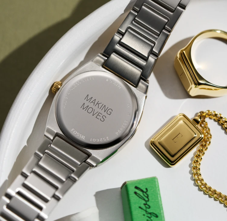 Personalized Fossil watch and jewelry.