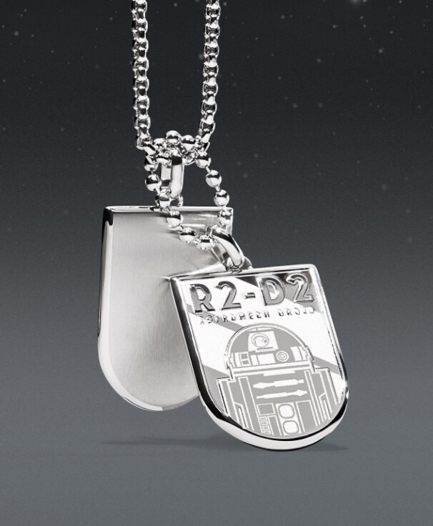 A silver-tone necklace with an engraving of R2-D2 on an ID plaque