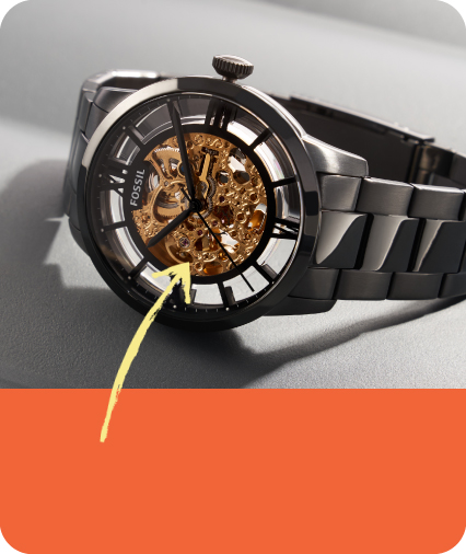 a mechanical watch with an arrow pointing to a highlighted item