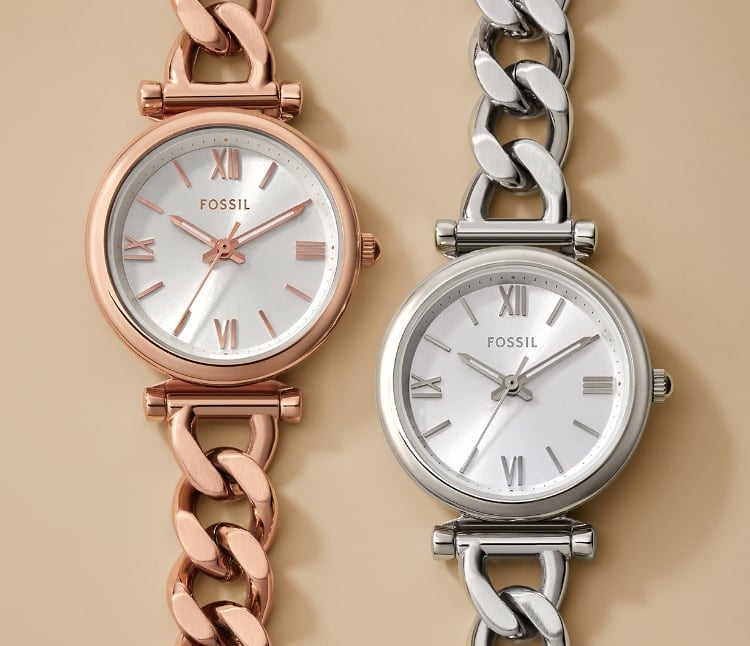 A rose gold-tone and a silver-tone Carlie watch.