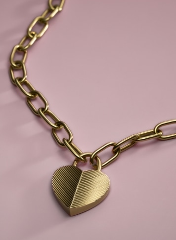 A gold-tone heart-shaped Harlow Hearts pendant necklace.