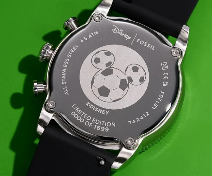 The custom caseback of the watch, featuring Mickey Mouse's silhouette in a football pattern, along with limited-edition numbering.