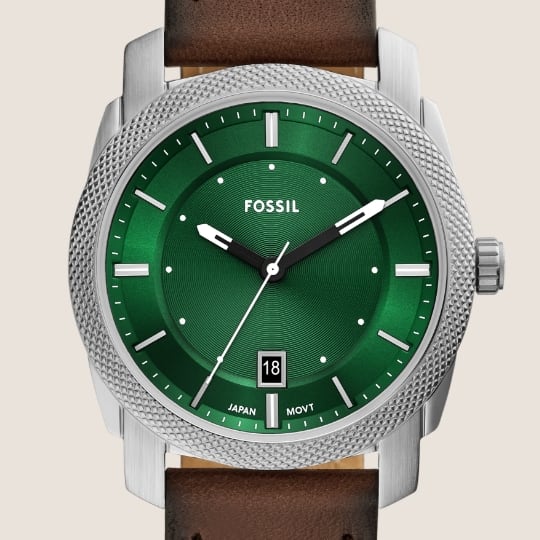 Brown leather Machine watch with green dial.