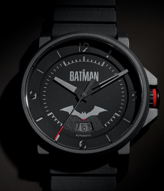 The Batman™ x Fossil watch on black background.