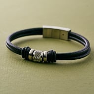 black leather Fossil bracelet.
