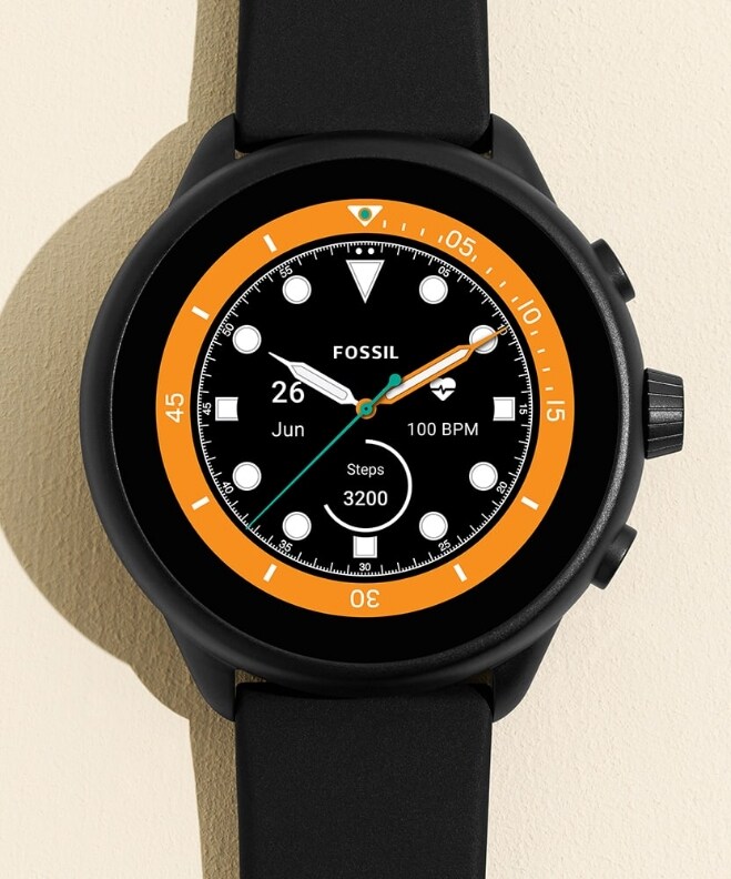 black and orange fossil watch