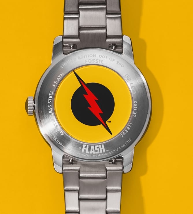 The limited edition The Flash™ x Fossil Reverse-Flash watch, featuring a yellow caseback with red lightning bolt emblem.