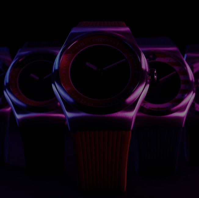 A shadowed silhouette of Fossil Big Tic watches in a pyramid formation.