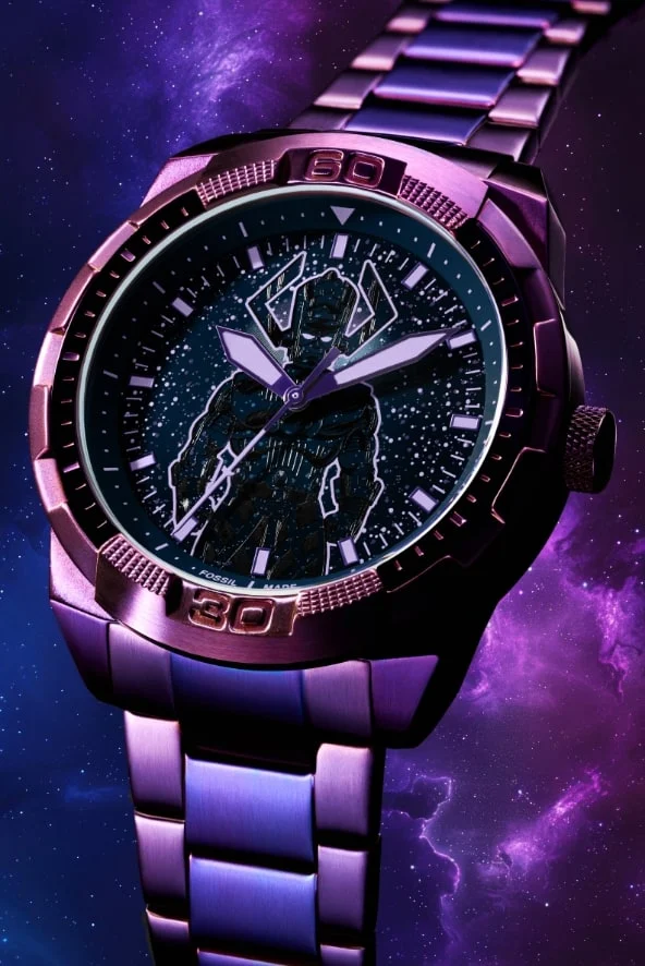 Blurred view of a round oversized watch silhouette on a glowing purple intergalactic background.