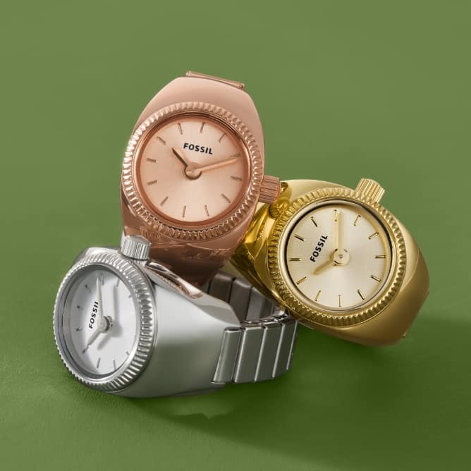 Trois bagues montre en doré rose, argenté et doré. 