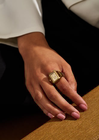 An artful collage of lifestyle images that show the styling possibilities of the Fossil Raquel watch, including jewellery and handbags to wear and pair.