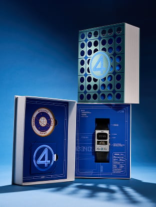 Image of Fossil x Fantastic Four watch in a box on a blue background.
