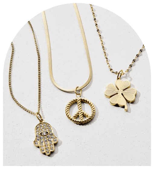 Three necklace chains with three charms.
