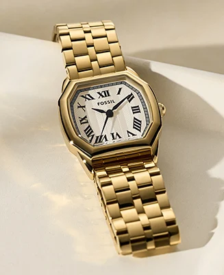 Die Uhr Harlow in goldfarbenem Finish mit einem achteckigen Gehäuse und cremefarbenem Zifferblatt.