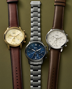 Multiple Neutra watches, showcasing the lume-filled hands.