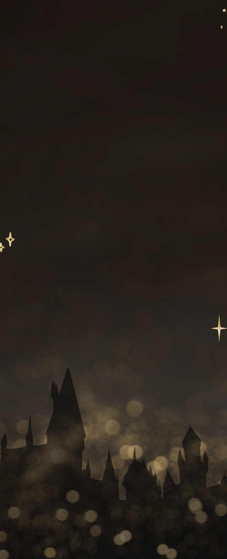 Une image de la silhouette du château de Poudlard encadré d’étoiles scintillantes.