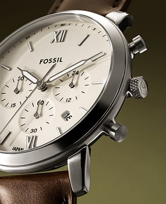 Detailed view showing the classic Neutra watch in a gold-tone finish.