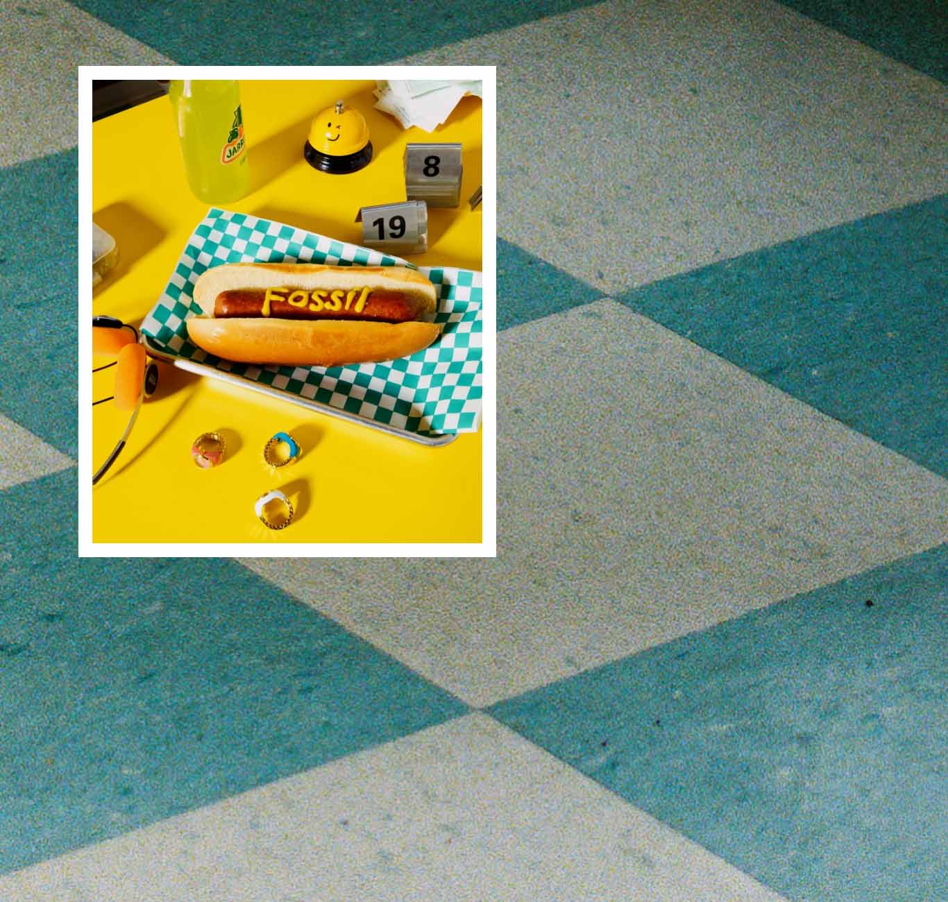 A group of friends in a vintage car alongside a photo collage of summery images, including a hot dog with Fossil written in mustard, a yellow bell ringer with a winking face and Polaroid pictures.