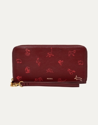 Un portafoglio rosso con animali stampati sopra. 