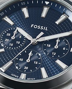 Integrated bracelet in a silver-tone finish.